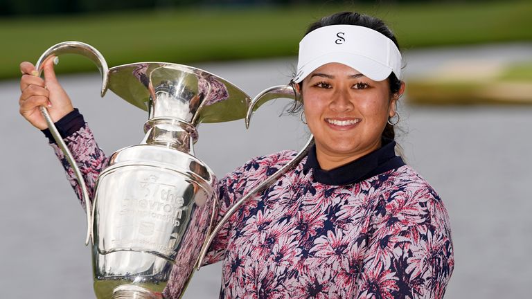 Lilia Vu holds the trophy after her playoff win against Angel Yin in the Chevron Championship women's golf tournament at The Club at Carlton Woods on Sunday, April 23, 2023, in The Woodlands, Texas. (AP Photo/David J. Phillip)
