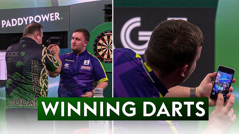 Luke Littler was happily taking selfies after beating Brendan Dolan 4-1 to reach the semi-final of the World Darts Championship.
