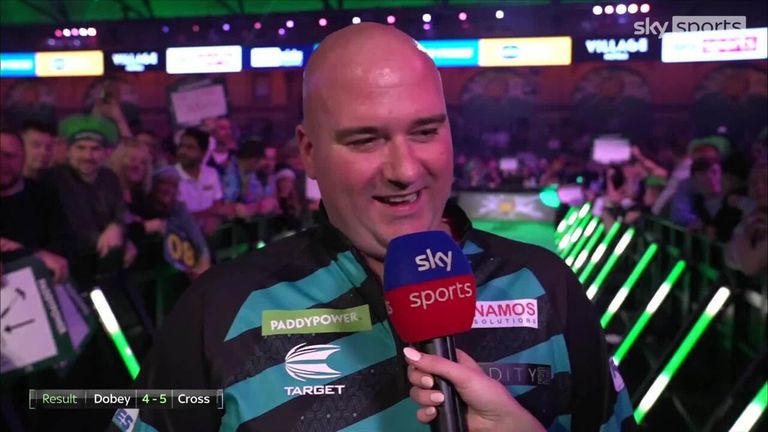 Rob Cross hit a 130 checkout to break Chris Dobey in the deciding set of their quarter-final