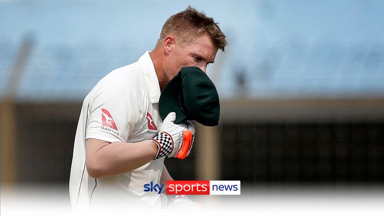 Australia's David Warner kisses his cap