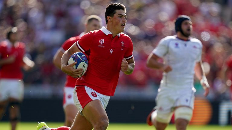 Wales' Louis Rees-Zammit runs in to score his sides third try against Georgia