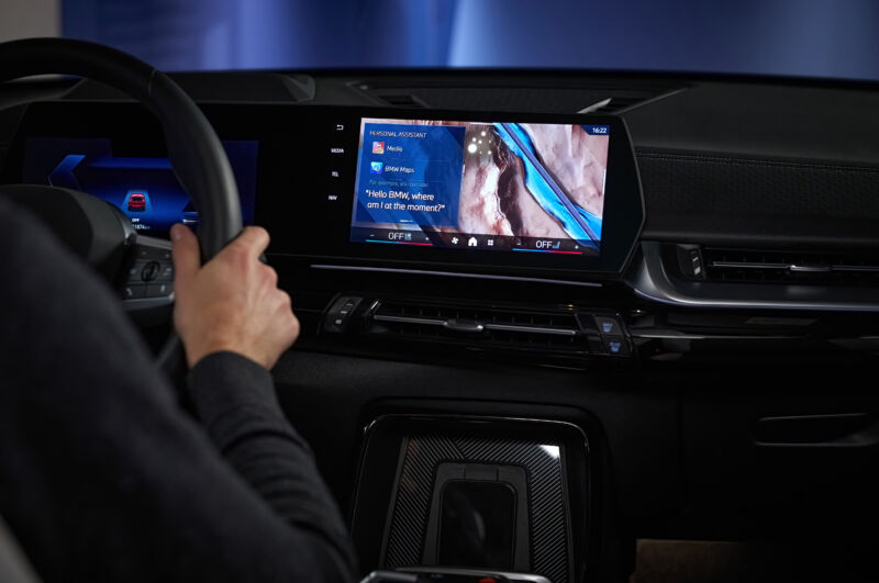 A BMW infotainment screen suggesting the driver ask the system 