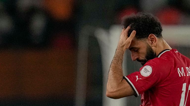 Egypt&#39;s Mohamed Salah leaves the field after sustaining an injury during the African Cup of Nations Group B soccer match between Egypt and Ghana