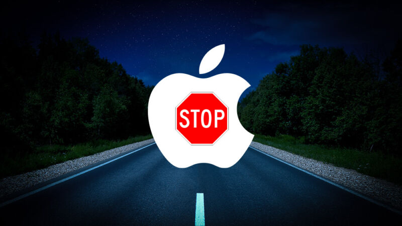 The apple logo with a stop sign in it, superimposed above the road