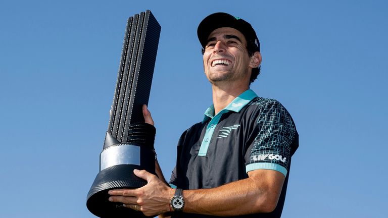 Captain Joaqu..n Niemann of Torque GC poses with the Event Individual Champion Trophy after the final round of LIV Golf Jeddah at the Royal Greens Golf & Country Club on Sunday, March 03, 2024 in King Abdullah Economic City, Saudi Arabia. (Photo by Charles Laberge/LIV Golf via AP)