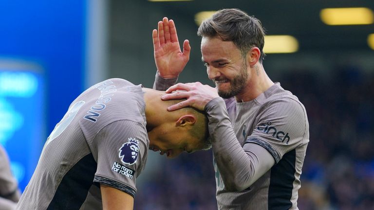 Tottenham's Richarlison, left, celebrates with James Maddison after scoring his side's second goal during the English Premier League soccer match between Everton and Tottenham Hotspur, at the Goodison Park stadium, in Liverpool, England, Saturday, Feb.