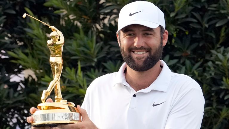 Scottie Scheffler celebrates after winning The Players Championship golf tournament Sunday, March 17, 2024, in Ponte Vedra Beach, Fla. (AP Photo/Lynne Sladky)