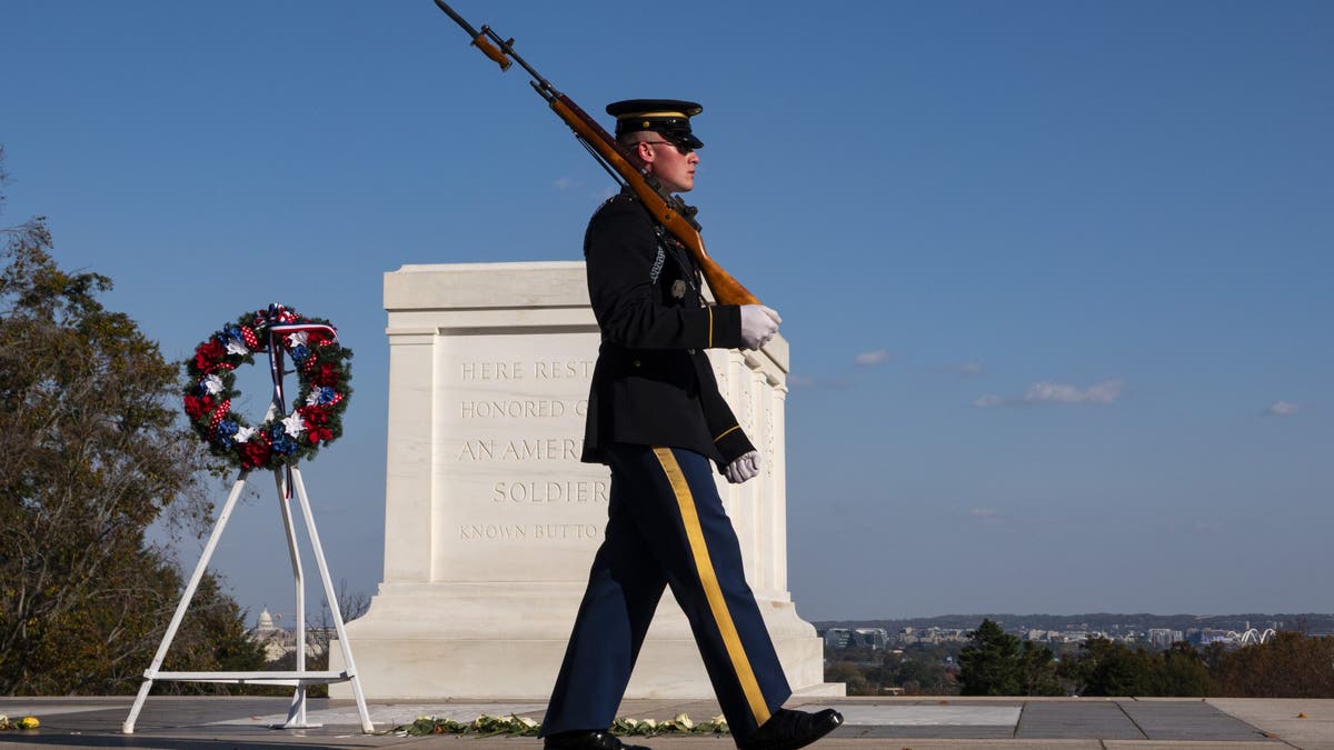 Soldier walks at Arlington National Cemetery