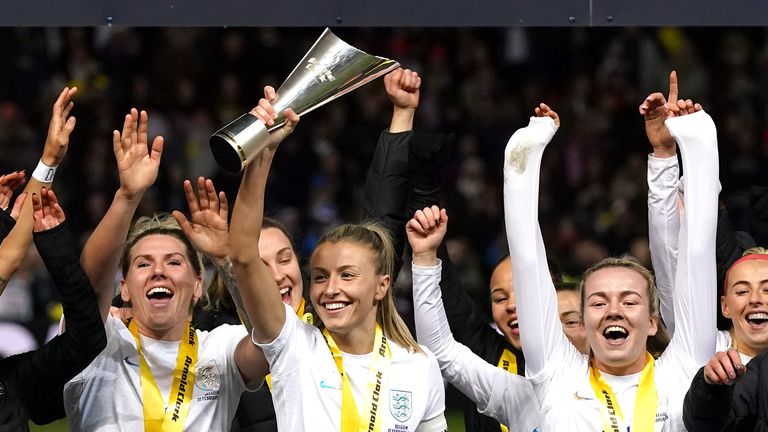 England captain Leah Williamson lifts the Arnold Clark Cup trophy after their 6-1 win over Belgium