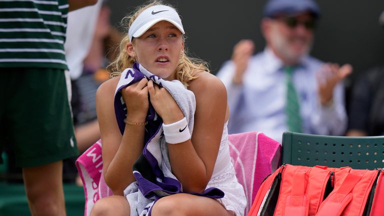 Russia's Mirra Andreeva sits in her chair during a change of ends break as she plays Madison Keys of the US in a women's singles match on day eight of the Wimbledon tennis championships in London, Monday, July 10, 2023. (AP Photo/Alastair Grant)