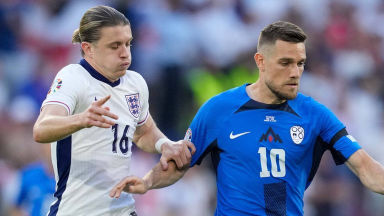 Conor Gallagher challenges for the ball with Timi Elsnik