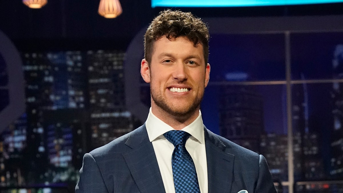 Clayton Echard wears a blue suit on The Bachelor taping