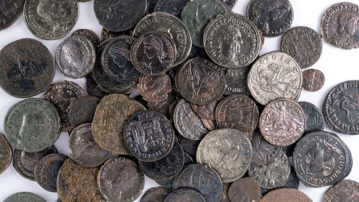 Ancient Roman coins spread out