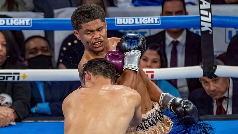 April 8, 2023, Newark, New Jersey, USA: SHAKUR STEVENSON and SHUICHIRO YOSHINO (purple and yellow trunks) battle in a WBC Lightweight Final Eliminator bout at the Prudential Center in Newark, New Jersey. Stevenson won by way of 6th Round TKO. (Cal Sport Media via AP Images)