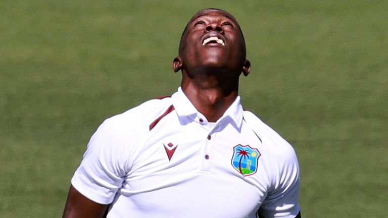 West Indies' Shamar Joseph celebrates after taking the wicket of Australia's Steve Smith (Associated Press)