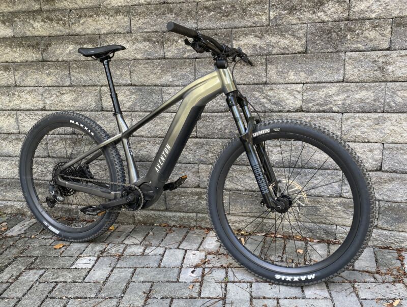 Image of a large, rugged frame with hefty wheels and a straight handlebar.