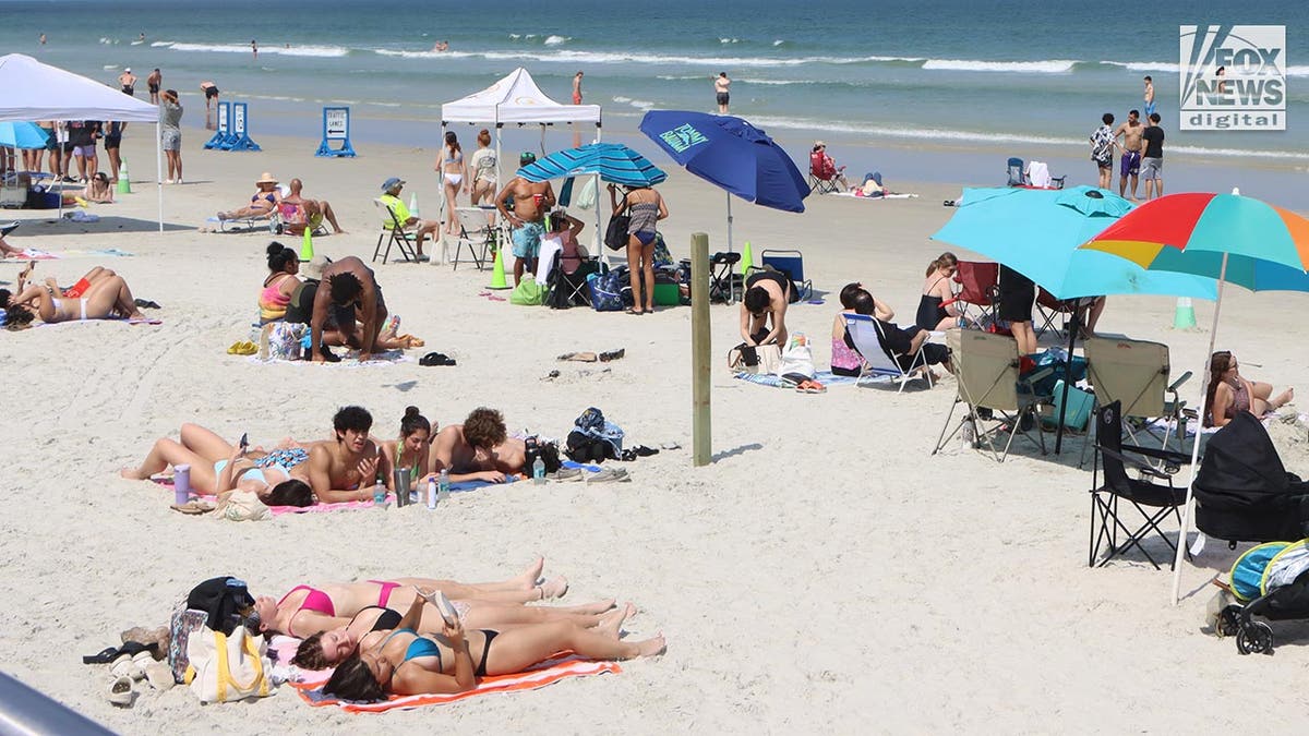 Spring breakers enjoy the beach in Florida