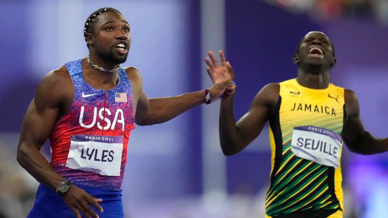 Noah Lyles, of the United States, celebrates after winning the men's 100-meter final at the 2024 Summer Olympics, Sunday, Aug. 4, 2024, in Saint-Denis, France. (AP Photo/Petr David Josek)