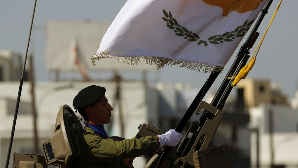 Soldier holds flag