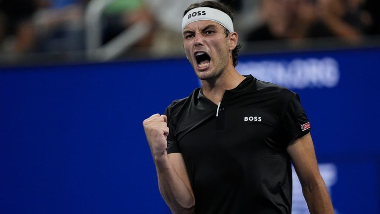 Taylor Fritz, of the United States, reacts against Mattia Bellucci, of Italy, during a second round match of the U.S. Open tennis championships, Wednesday, Aug. 28, 2024, in New York. (AP Photo/Matt Rourke)