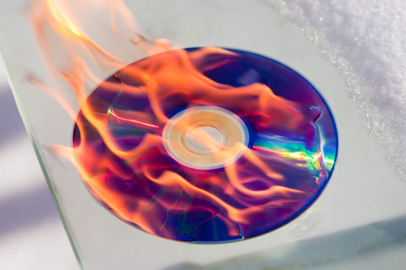 Photograph of a CD-R disc on fire