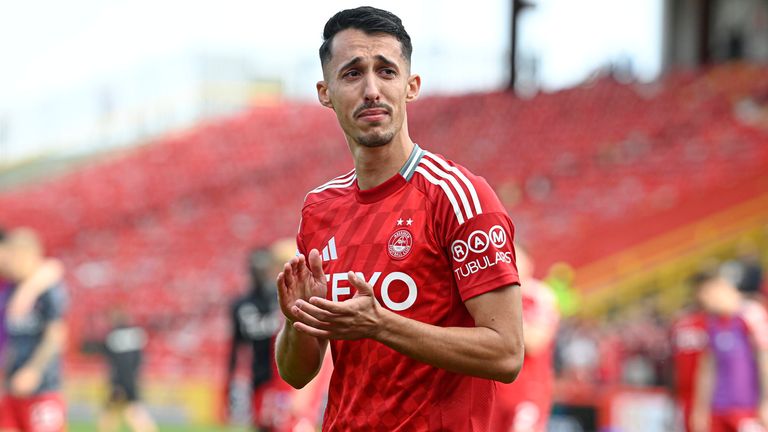 ABERDEEN, SCOTLAND - AUGUST 11: Aberdeen's Bojan Miovski tearfully says goodbye to the fans during a William Hill Premiership match between Aberdeen and St Mirren at Pittodrie, on August 11, 2024, in Aberdeen, Scotland. (Photo by Rob Casey / SNS Group)