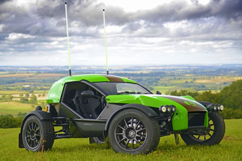 A green and black Ariel E-Nomad seen in the English countryside