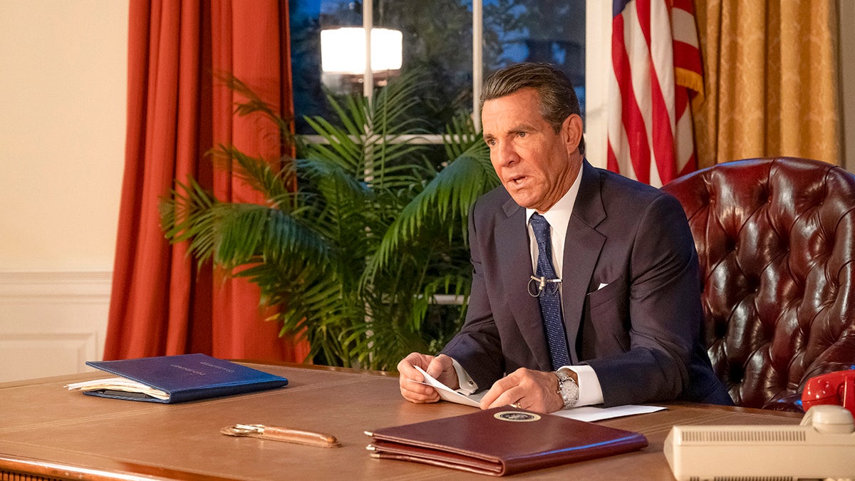 Dennis Quaid in character as Ronald Reagan in the Oval Office