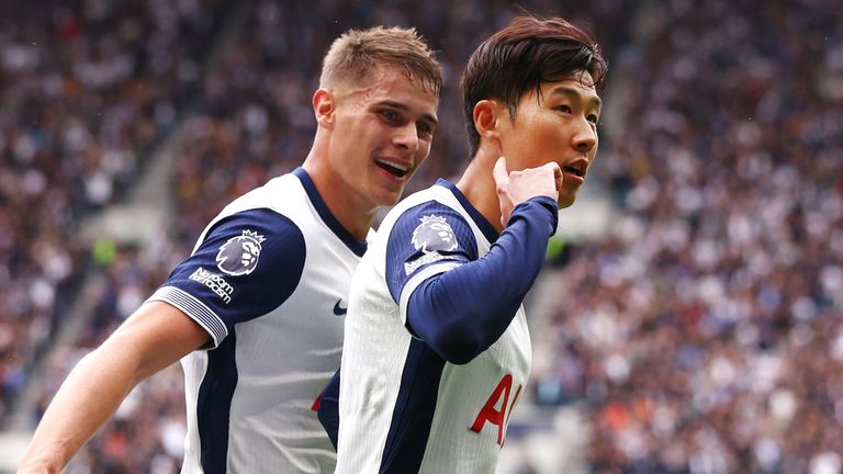 Heung-Min Son celebrates his second goal with team-mate Micky van de Ven 