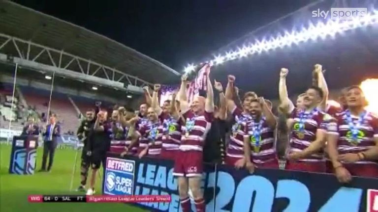 Watch Wigan Warriors lift the trophy after defeating Salford Red Devils 64-0