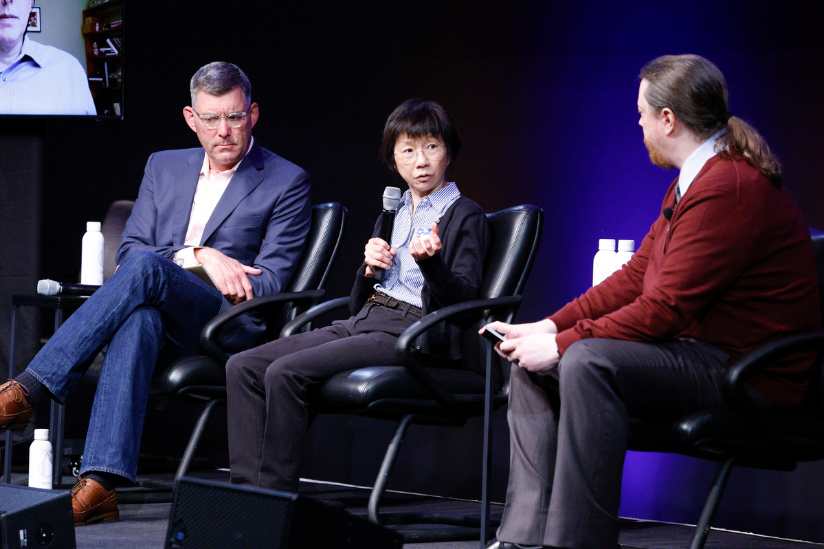 Joanna Wong (center) answers a question.