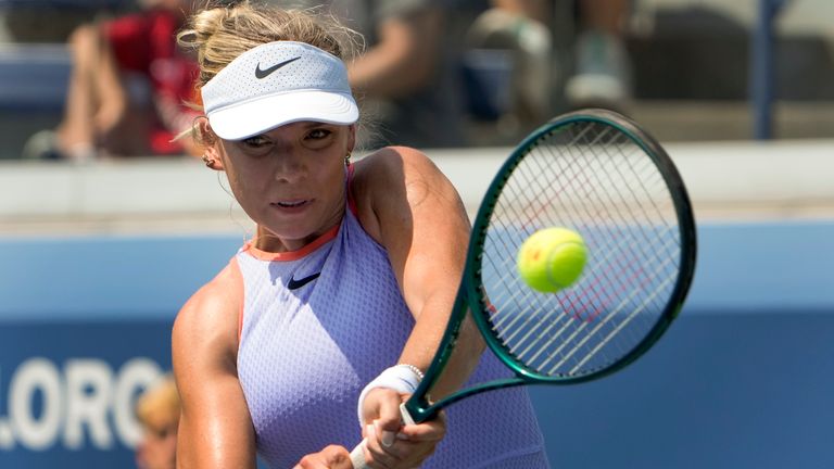 Katie Boulter, of Great Britain, returns a shot to Aliaksandra Sasnovich, of Belarus, during the first round of the U.S. Open tennis championships, Tuesday, Aug. 27, 2024, in New York. (AP Photo/Julia Nikhinson)