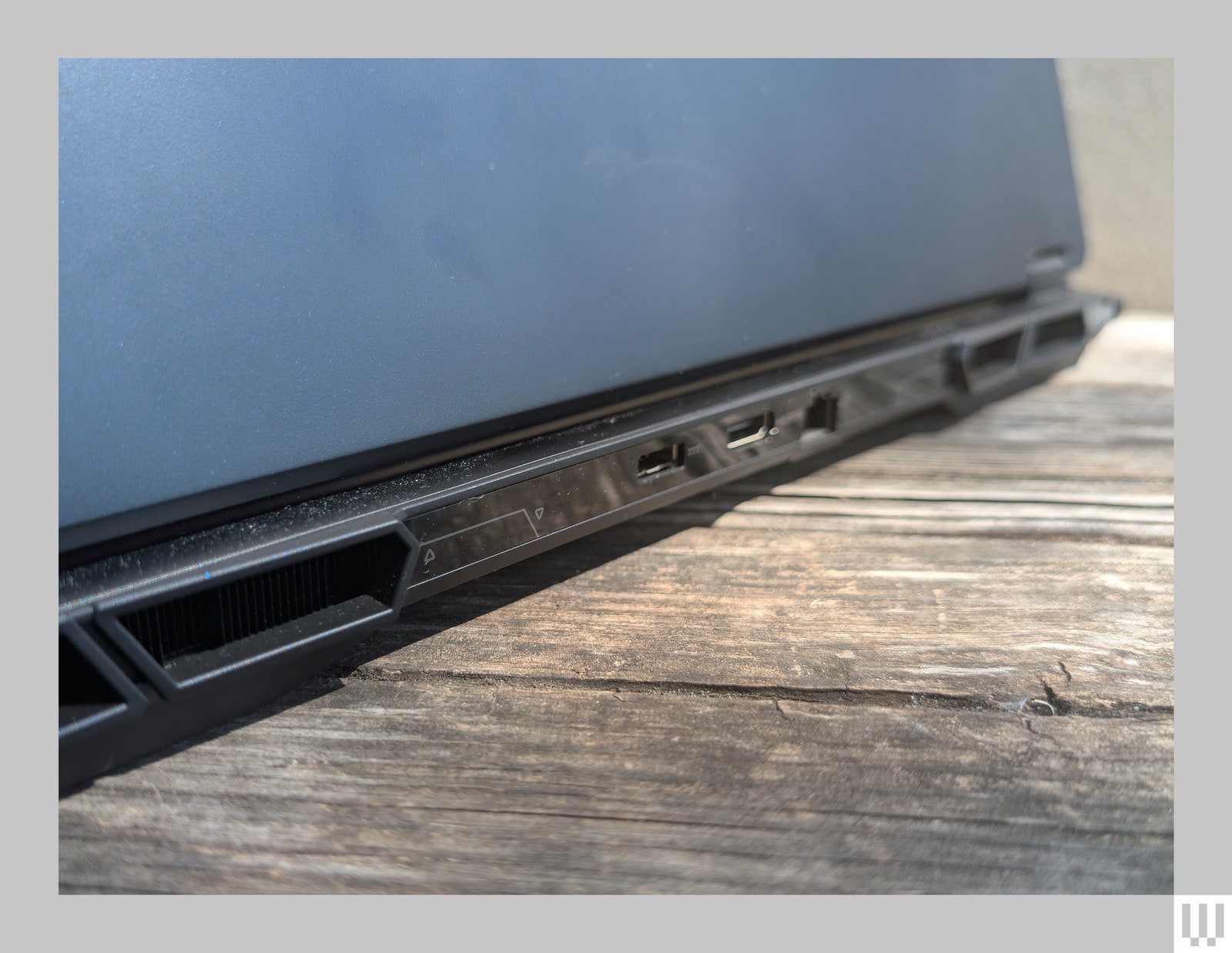 Back of a black laptop showing the ports