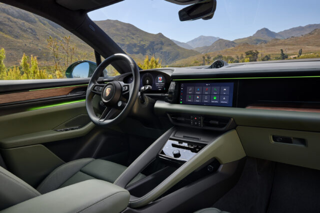 A Porsche Macan EV interior showing the door lighting