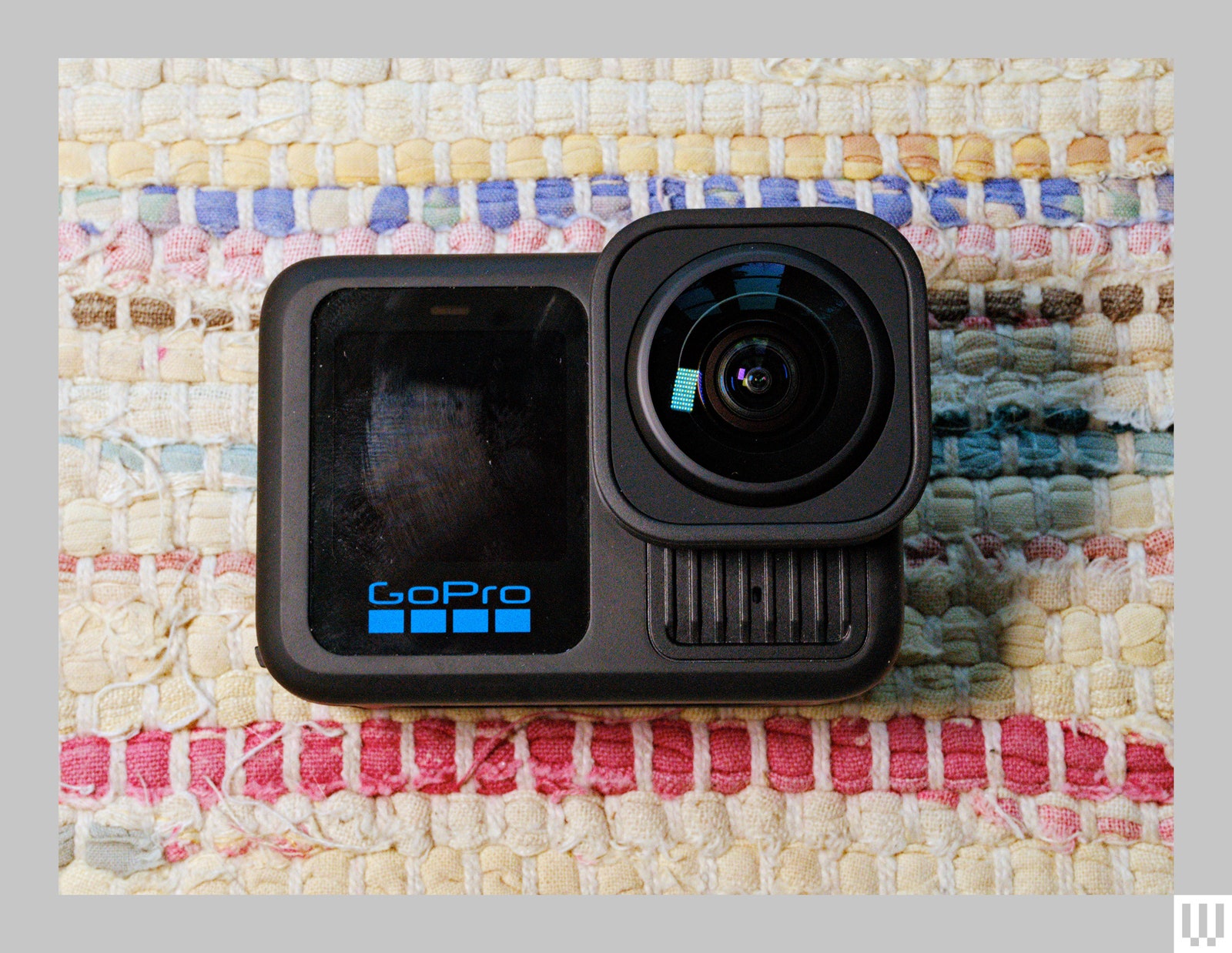 The GoPro Hero 13 Black a small camera with a  digital screen on the left and a square lens on the right