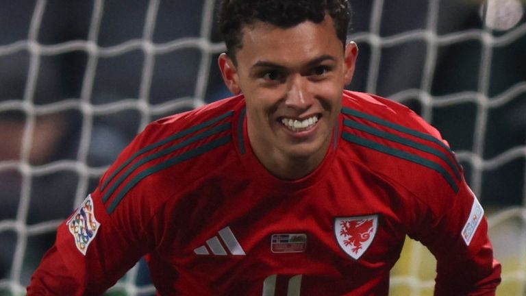 Brennan Johnson of Wales celebrates after scoring the opening goal during the UEFA Nations League group 4 soccer match between Iceland and Wales in Reykjavik, Iceland, Friday, Oct. 11, 2024. (AP Photo/Arni Torfason)