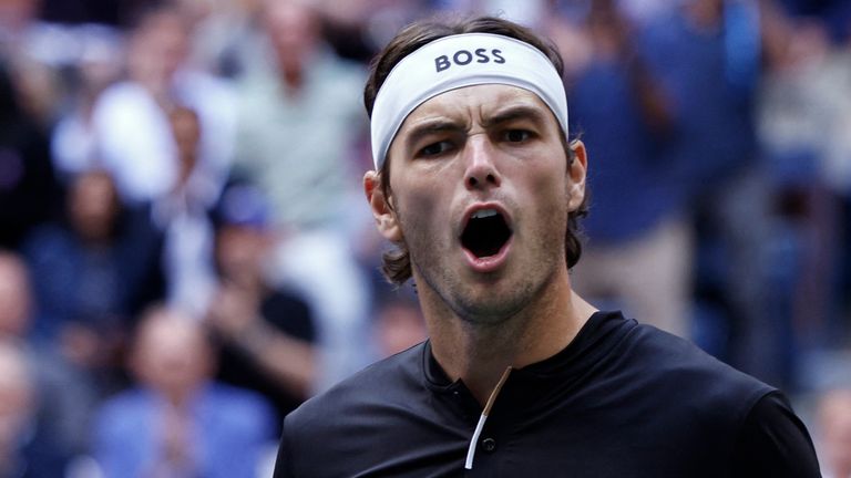 USA's Taylor Fritz celebrates a crucial point against Italy's Jannik Sinner during the men's US Open final