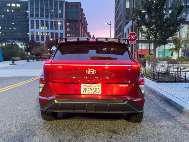 A Hyundai Kona Electric seen from the rear