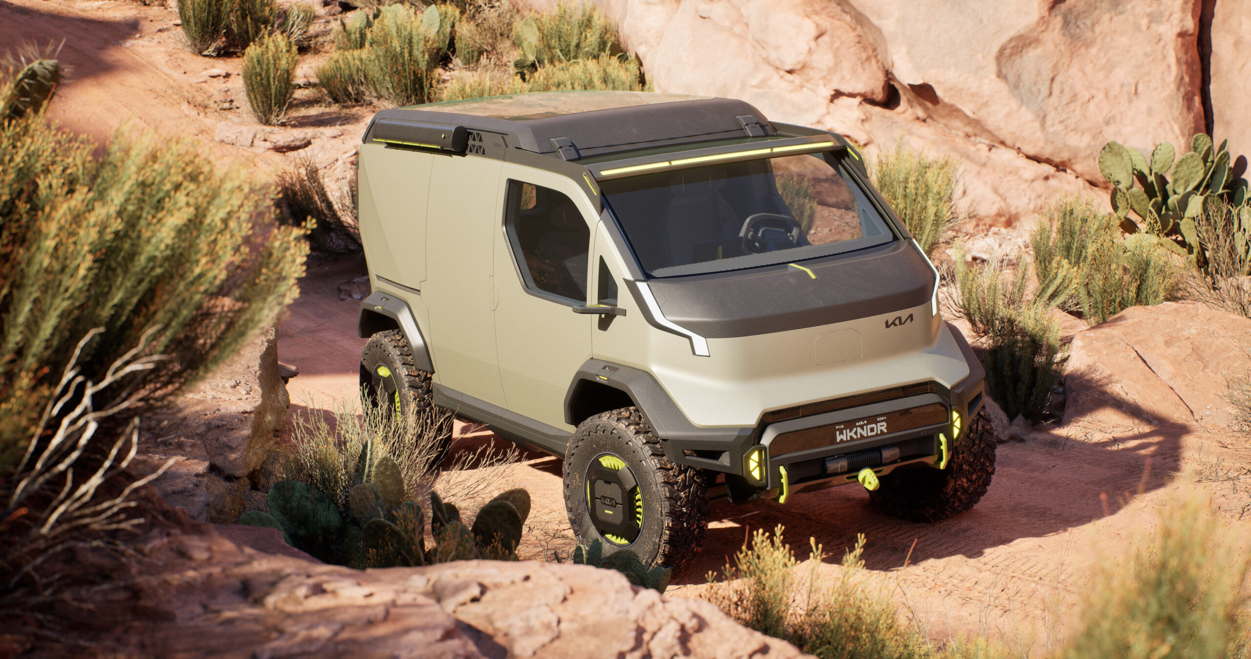 A matte green off-road camper van seen in the desert.