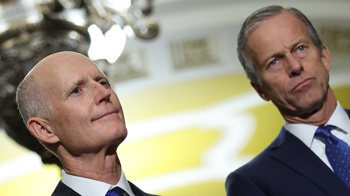 Rick Scott, John Thune