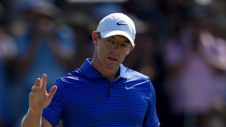 Rory McIlroy of Northern Ireland acknowledges the crowd after scoring a birdie on the 9th green in the final round of World Tour Golf Championship in Dubai, United Arab Emirates, Sunday, Nov. 17, 2024. (AP Photo/Altaf Qadri)