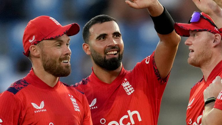 England's Saqib Mahmood and Phil Salt (Associated Press)