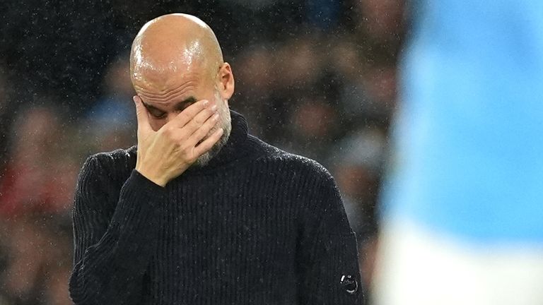 Pep Guardiola appears dejected with his side trailing Spurs at home 