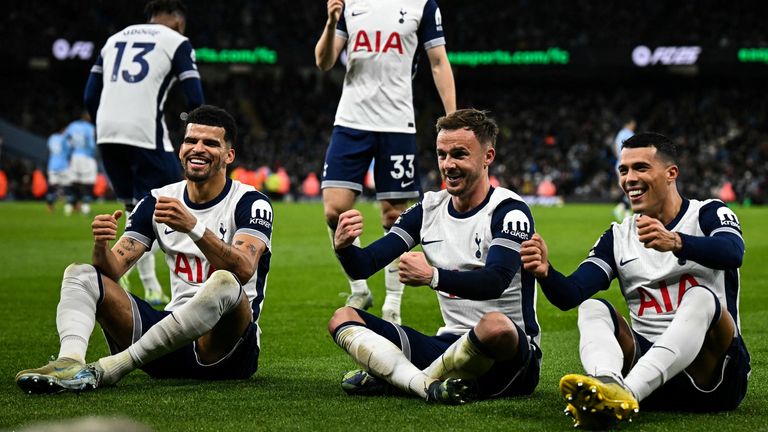 Pedro Porro celebrates with team-mates James Maddison and Dominic Solanke after Spurs take a 3-0 lead at the Etihad Stadium