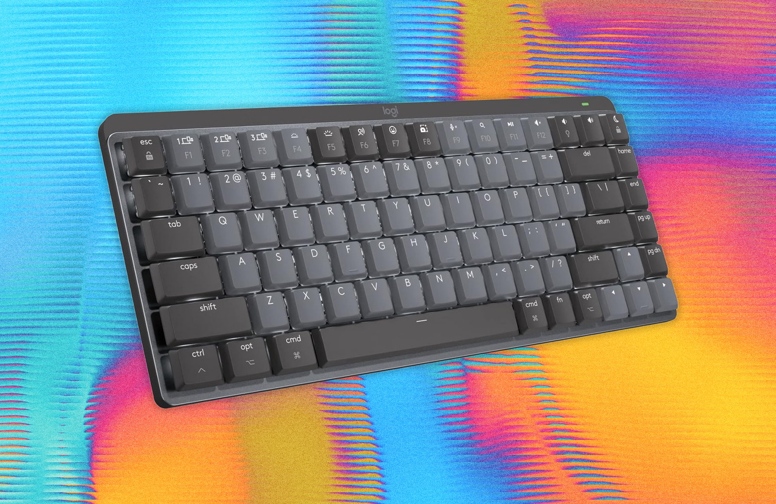 Black and grey computer keyboard. Background red orange and blue heatmap texture.