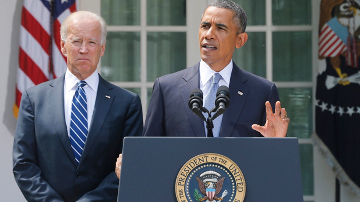 Aug. 31, 2013: President Obama with Vice President Biden as he makes a statement about Syria in the Rose Garden at the White House in Washington.