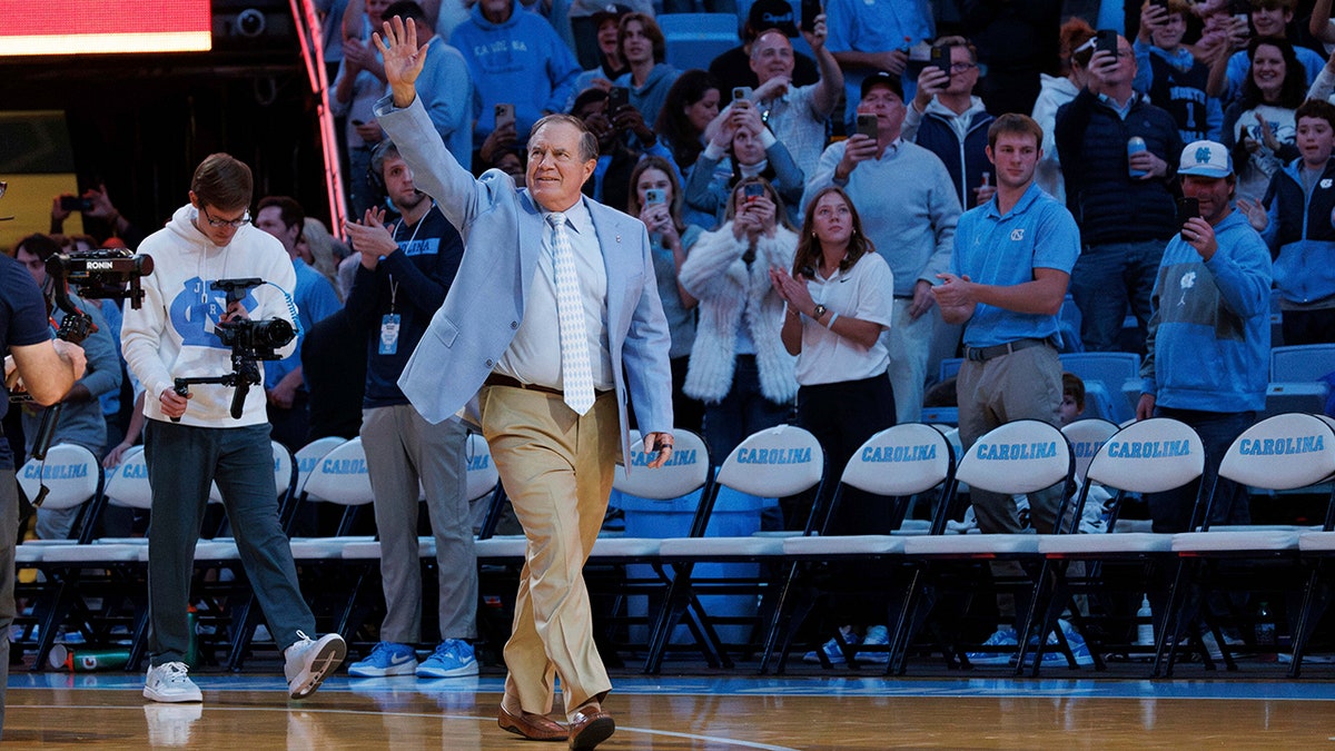 Bill Belichick waves