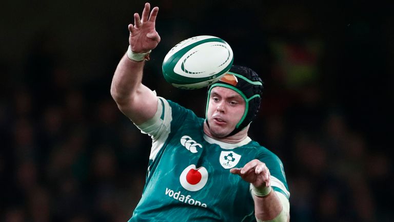 Ireland's James Ryan, palms the ball back in a line out during the the Autumn Nations series rugby union match between Ireland and New Zealand at the Aviva Stadium in Dublin, Ireland, Friday, Nov. 8, 2024. (AP Photo/Peter Morrison)