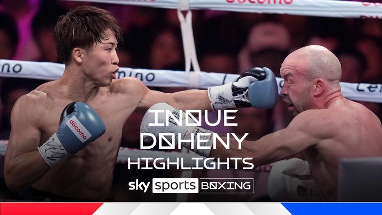 Japanese champion Naoya Inoue, left, and Irish challenger TJ Doheny, right, during the first round of a boxing match for the unified WBA, WBC, IBF and WBO super bantamweight world titles in Tokyo, Tuesday, Sept. 3, 2024. (AP Photo/Hiro Komae)


