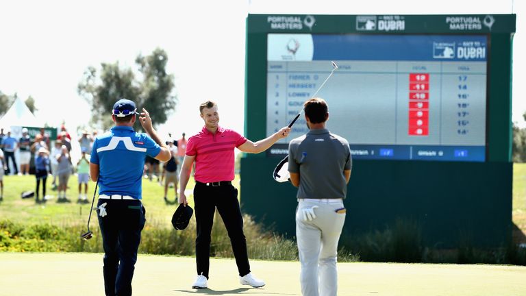England's Oliver Fisher celebrates after shooting a round of 59 in Vilamoura